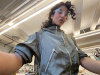 a woman is upside down in a room